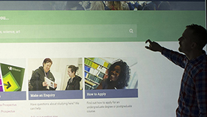 Teaching in front of large screen