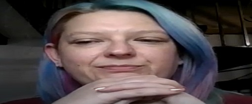 Claire Taylor photographed with her hands together.