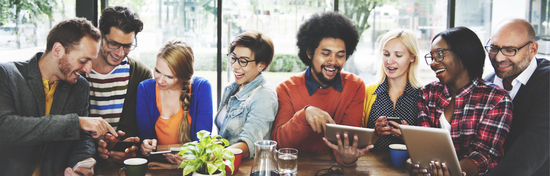 A group of students sat together in a communal area.