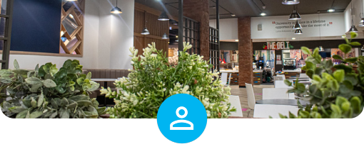 Screenshot of the Loyalty Caring App showing an alert accompanied with a photograph of the Millennium City building Deli.