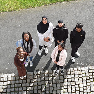 Students standing outside the entrance to the School of Art