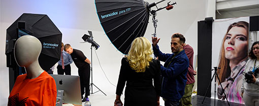 Photoshoot, in the photography studio for Prosper Magazine, the magazine for the Black Country Chamber of Commerce. Staff and students can be seen setting up to photograph the latest cover image for the magazine. You can can see a variety of photographic equipment in this image including lightings backdrops and cameras on tripods