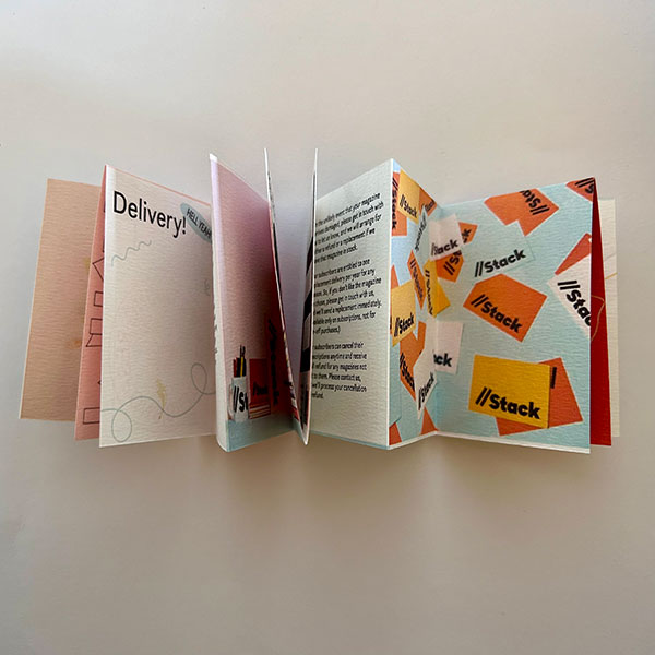 A folding magazine with various pieces of artwork by Amy Cole.