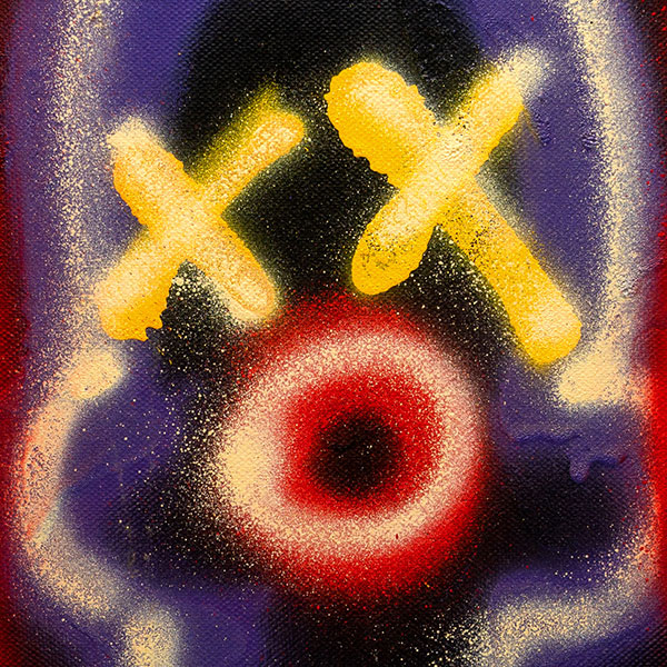 Spray-style painting of various red, blue and yellow shapes on a black background, at its centre the outline of a human head with round lips and two crosses in place of its eyes.