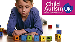 Child playing with letterblocks