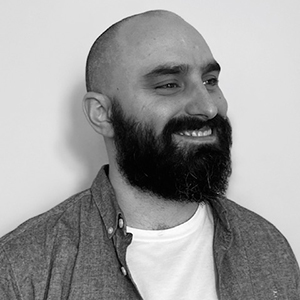 Portrait of Animation graduate, Samuel Walsh he is smiling