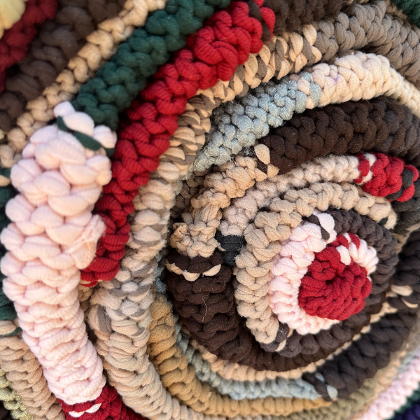 Artwork by Karen Dowd depicting a pattern comprised of different fabrics.