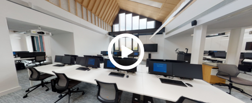 Interior of Springfield Campus showing a second floor computer lab, a play button identifying this as a video link