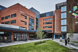 Image of the courtyard on City Campus with students leaving and entering the Rosalind Franklin building