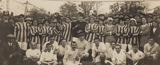 A black and white photo of a football team