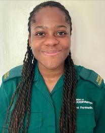 Student Esther in Paramedic Science uniform smiling