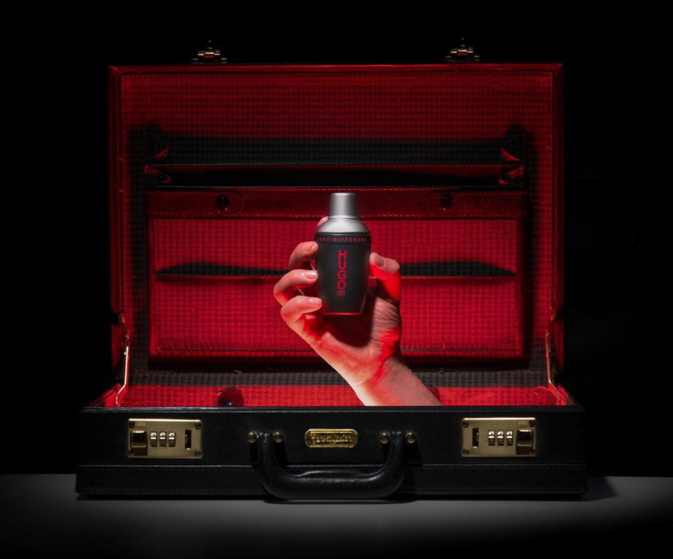 a photo of a hand coming out of a briefcase