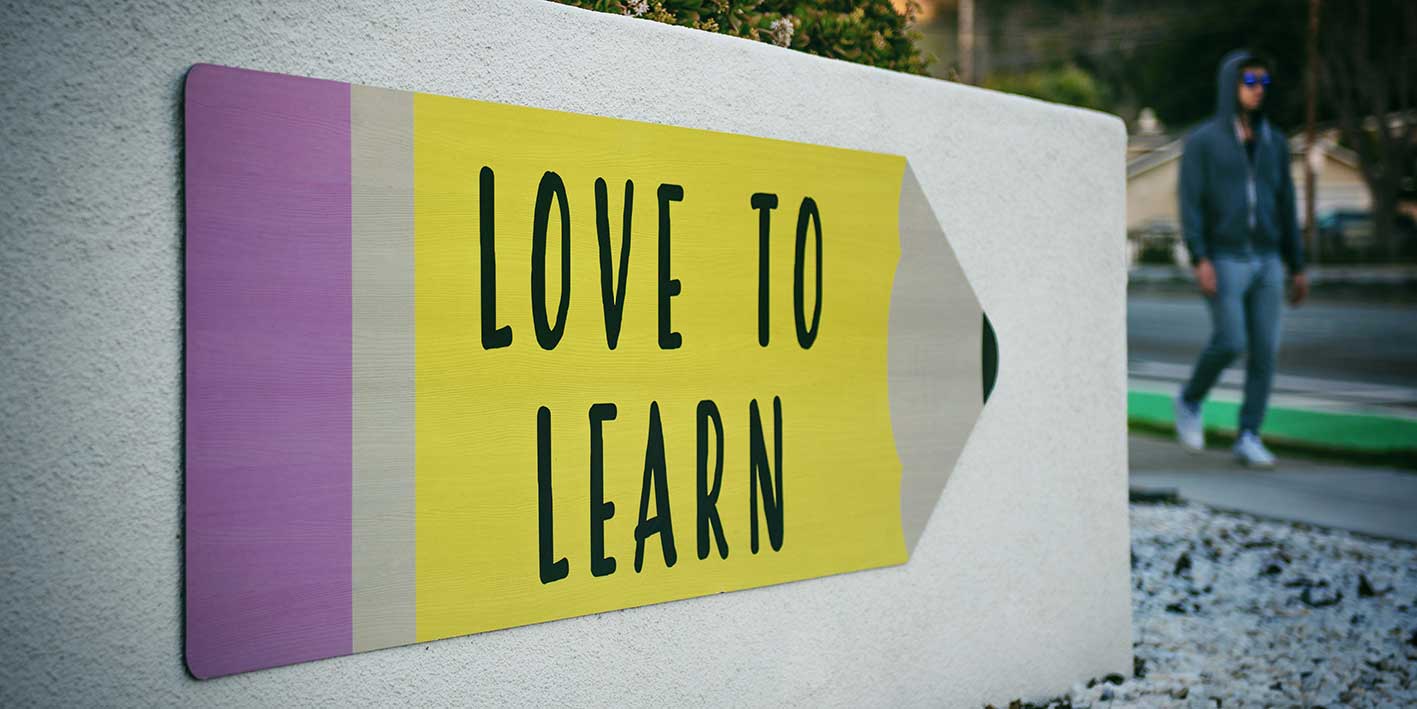 sign on a college campus with the words 