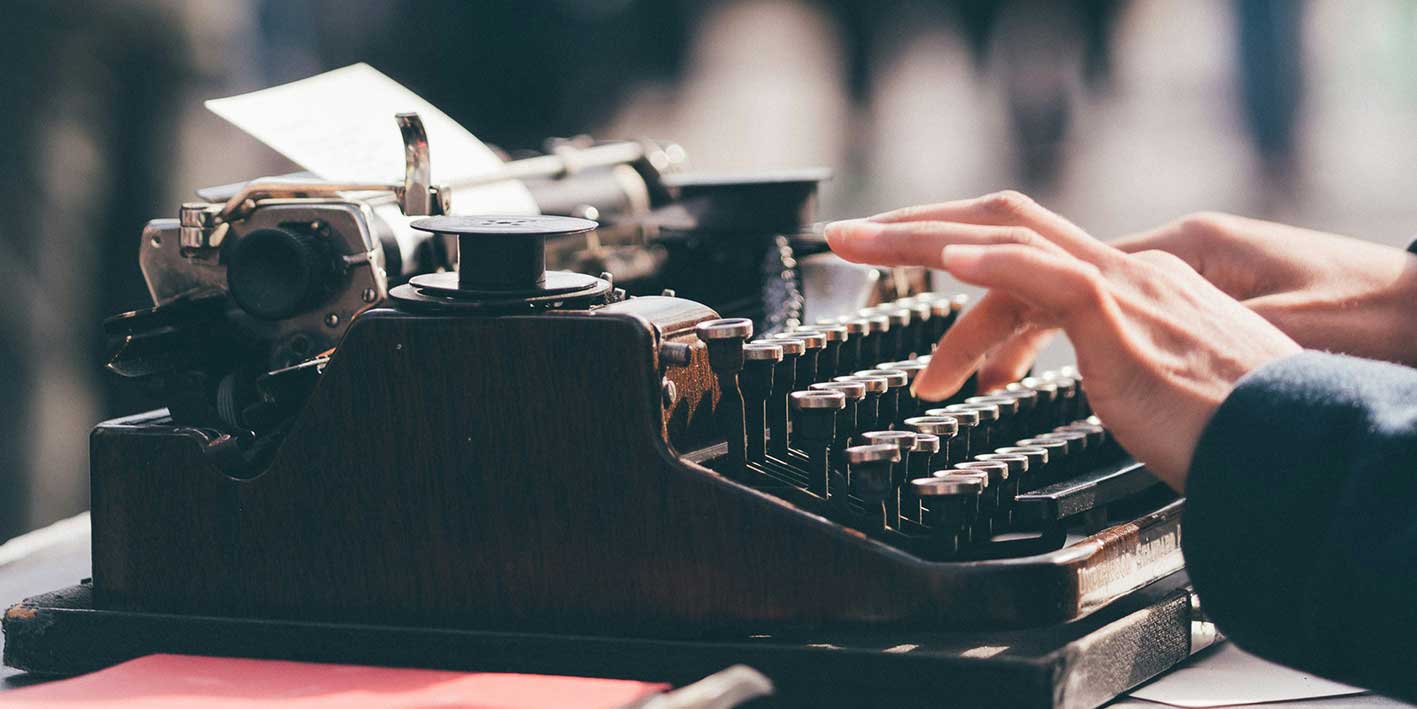 a person using a typewriter