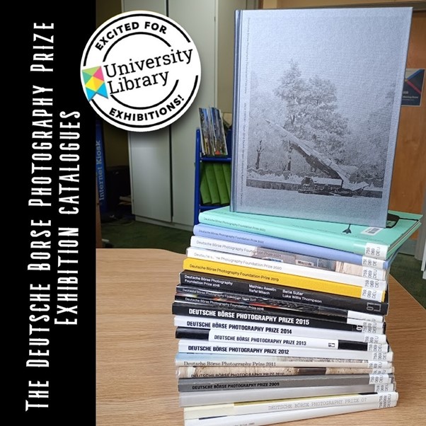 Pile of of books on table