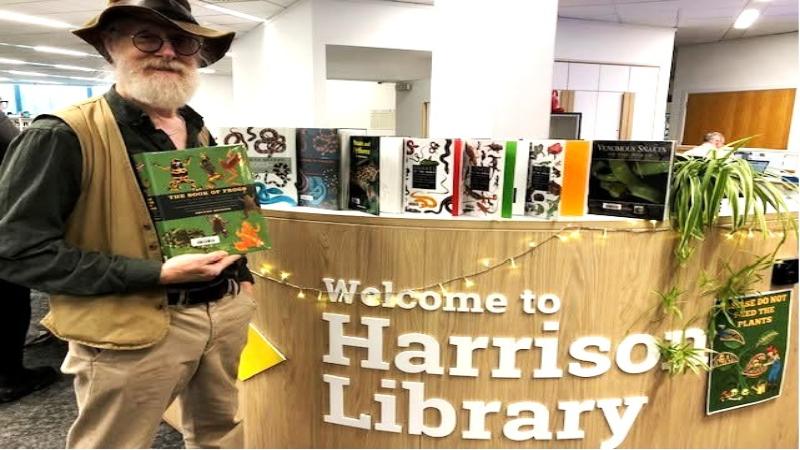 An academic with his books