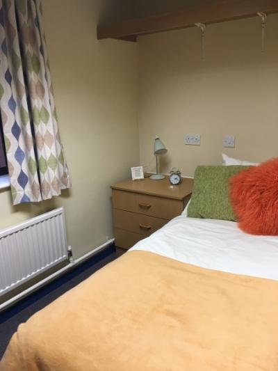 Image of a bedroom in Telford ensuite accommodation, showing a bed