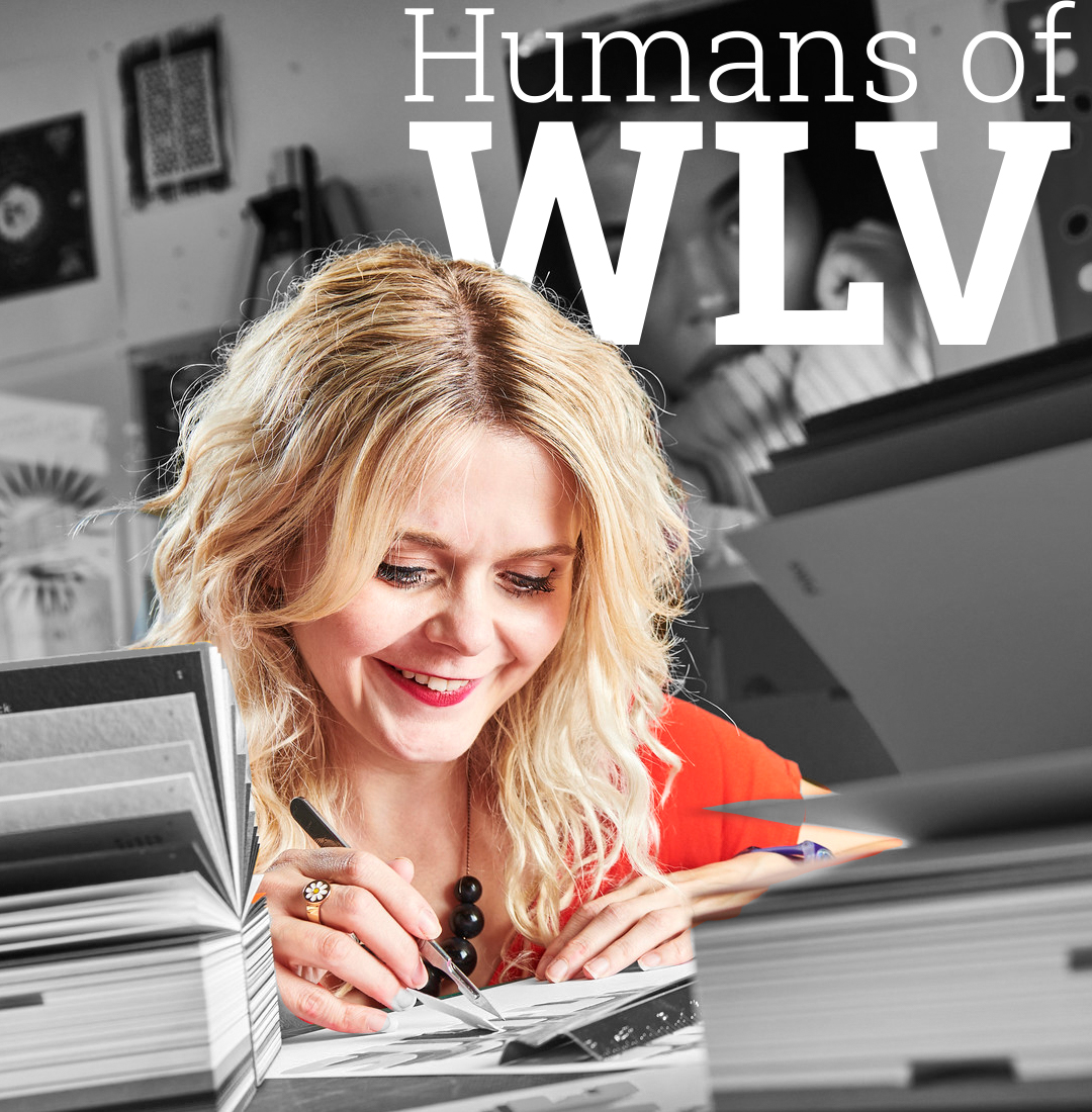 Charlotte working at a desk