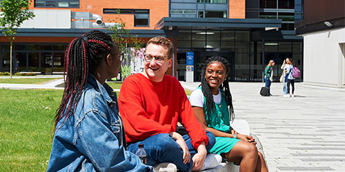 students_sat_outside_