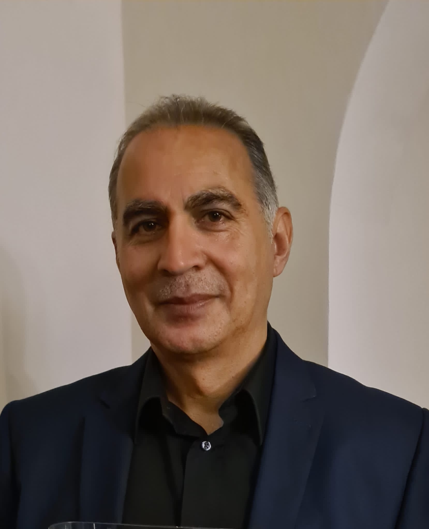 Portrait picture of Asrar OBE Recipient