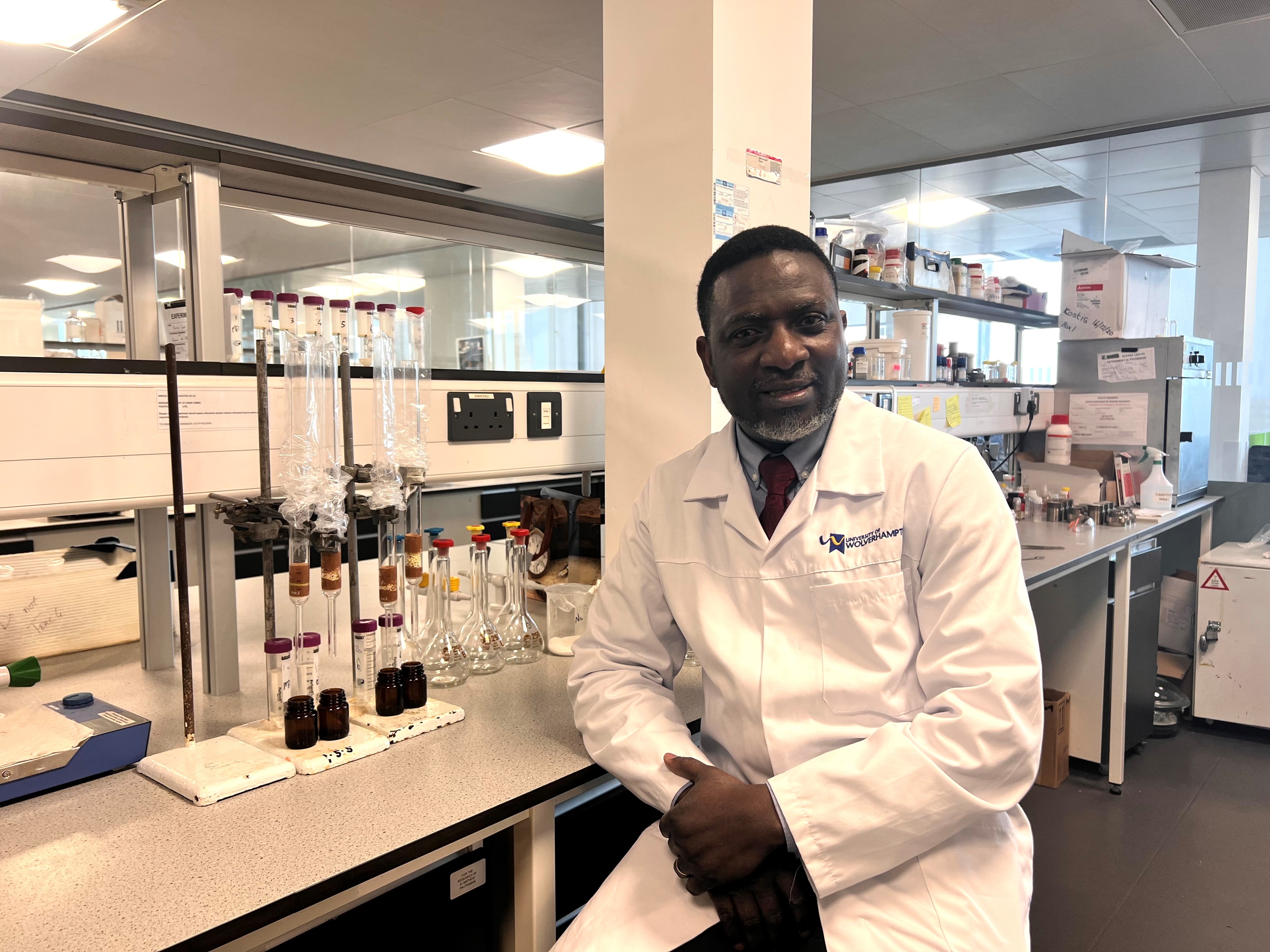 Image of researcher, Dr Ojo, in a laboratory