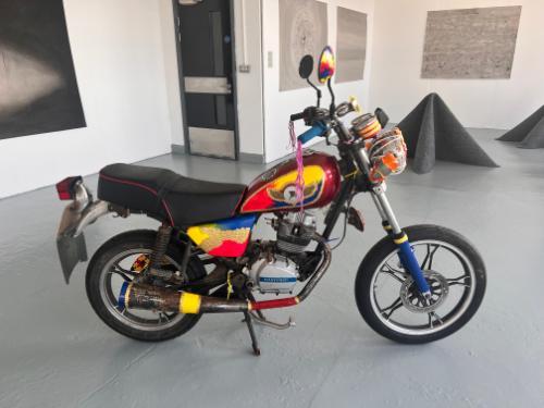 A motorbike on display at the student Degree Show