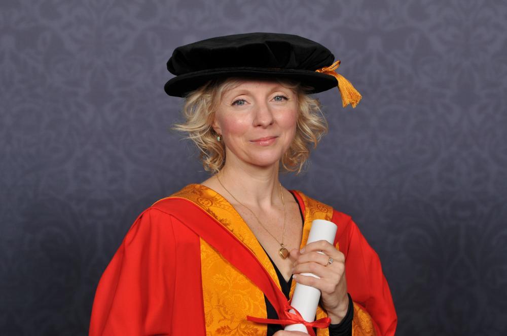 Landscape image of Honorary Graduate Liz Berry with her award