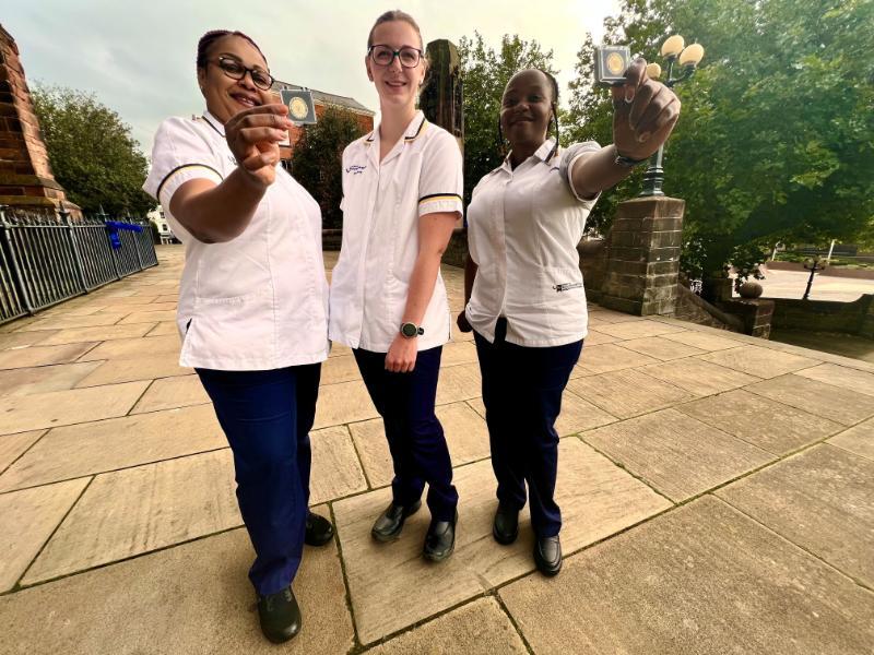 Nurses celebrating at their badge ceremony in Wolverhampton