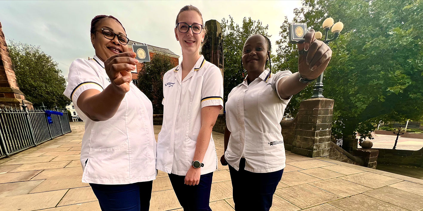 Nurses celebrating at their badge ceremony at City Campus