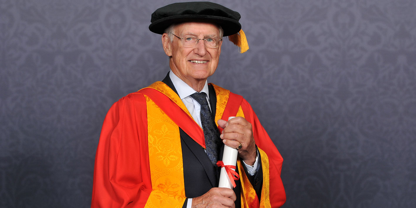 Honorary Graduate Bob Warman with his Honorary Award