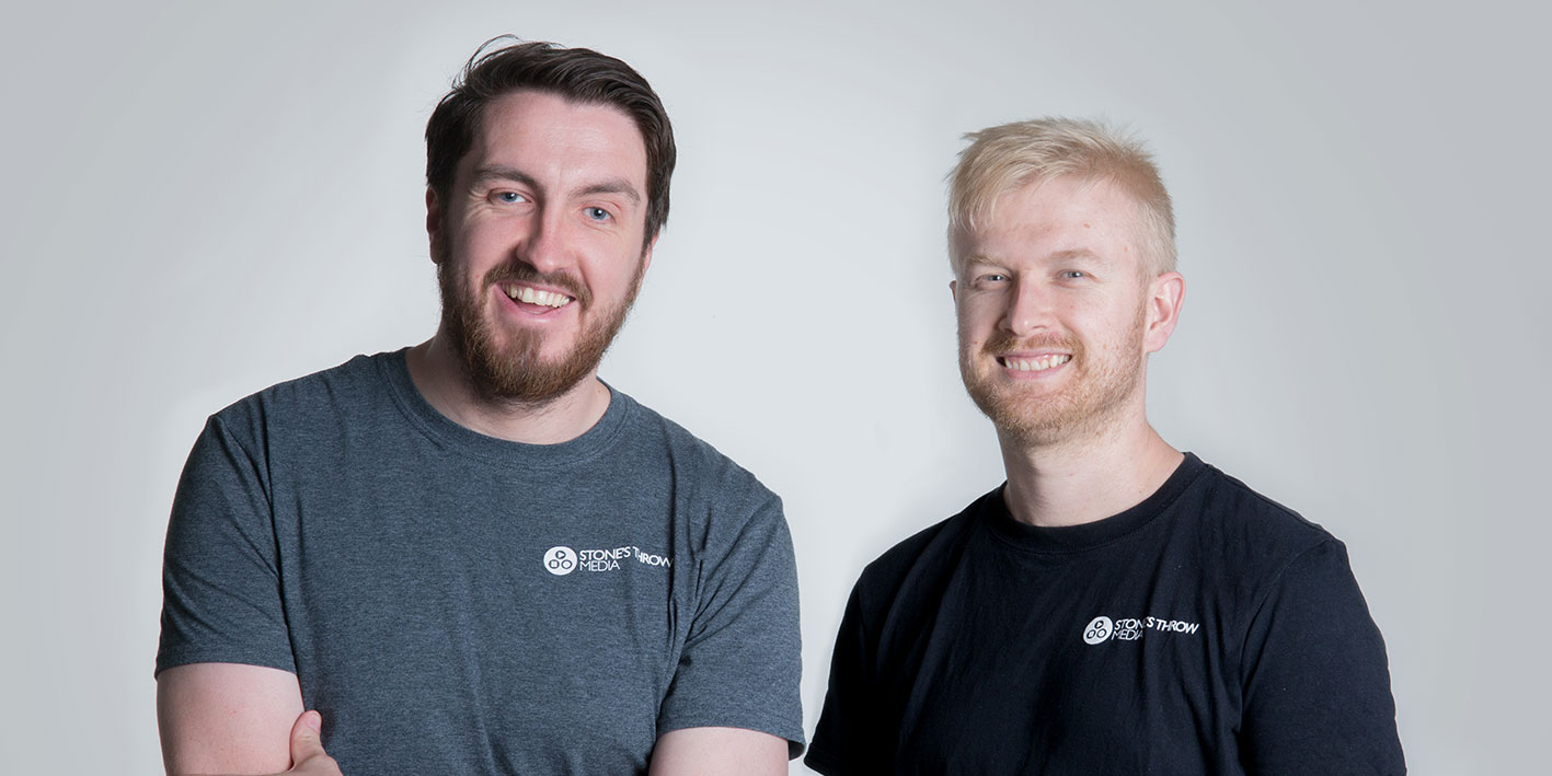 Portrait of two graduates who have set up a digital media company