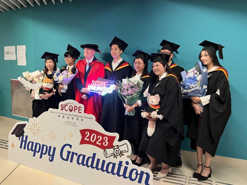A group of students looking at the camera after graduating in Hong Kong