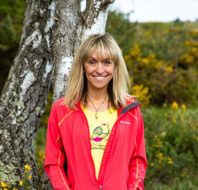 An image of Michaela Strachan BBC TV presenter smiling at the camera