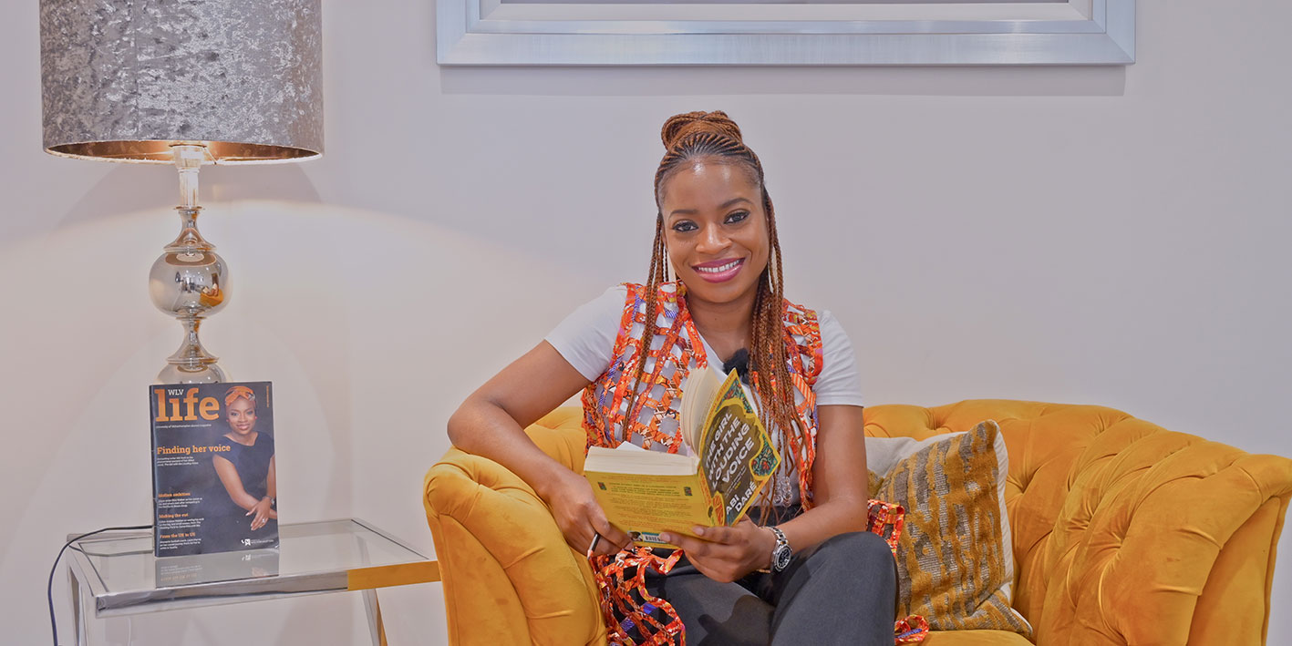 Portrait of alumna, Abi Dare, with her bestselling novel