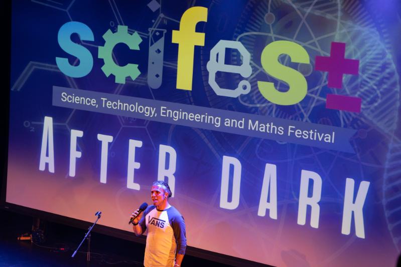 SciFest Dr Martin Khechara on stage at the After Dark event