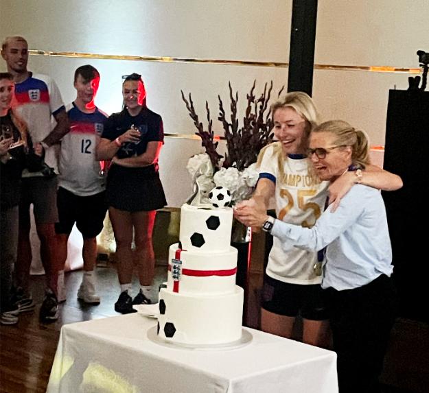 Kerys Harrop cutting cake