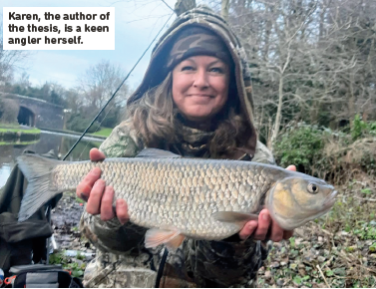 Karen McEntegart psychology graduate and keen angler holding a fish