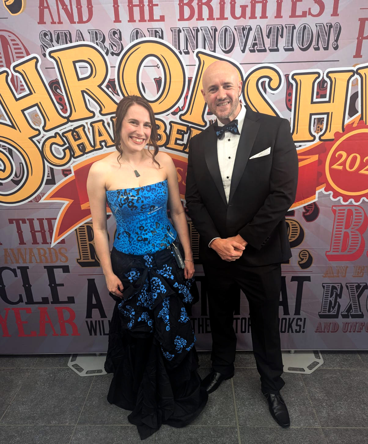 Lauren Chandler, Sales Office Manager at MyWorkwear modelling fashion a design by student Hannah De Haan at the Shropshire Chamber Business Awards