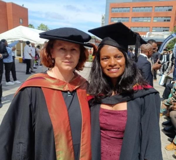 Prathima Morbagilu Nagabhushana in graduation robes with Professor Iza Radecka