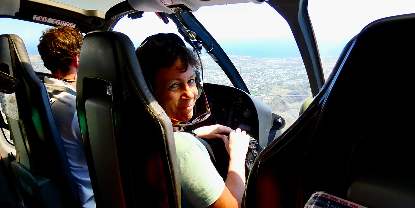 Catharine Cellier-Smart alumni in helicopter
