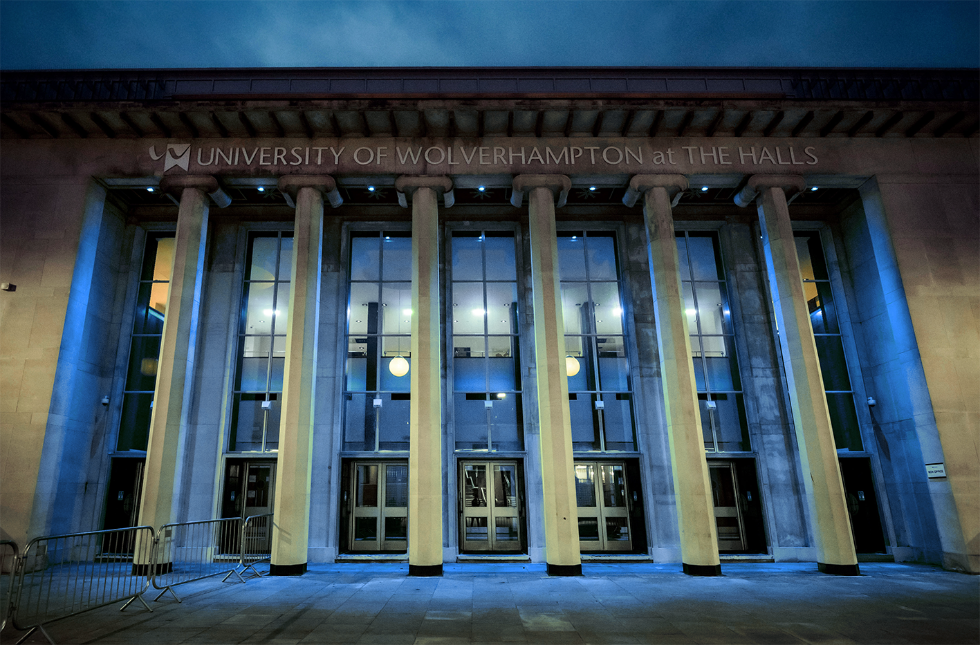 External of University of Wolverhampton at The Halls with blue lighting