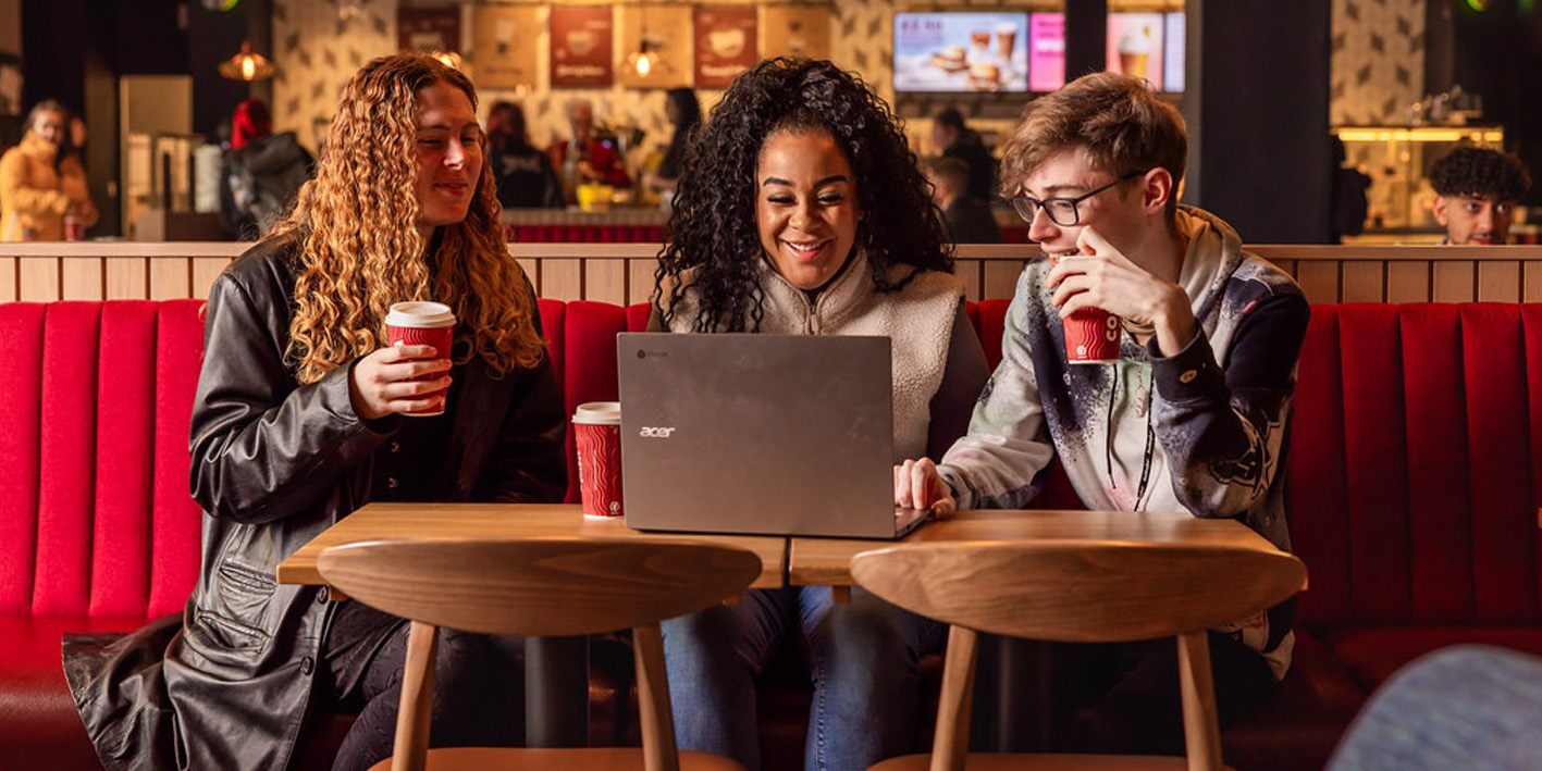 students at a laptop