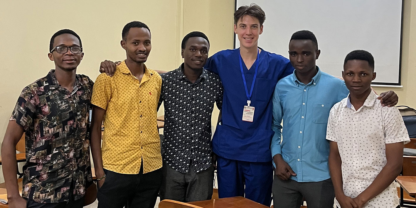 A Physiotherapy degree student on placement in Tanzania with hospital staff