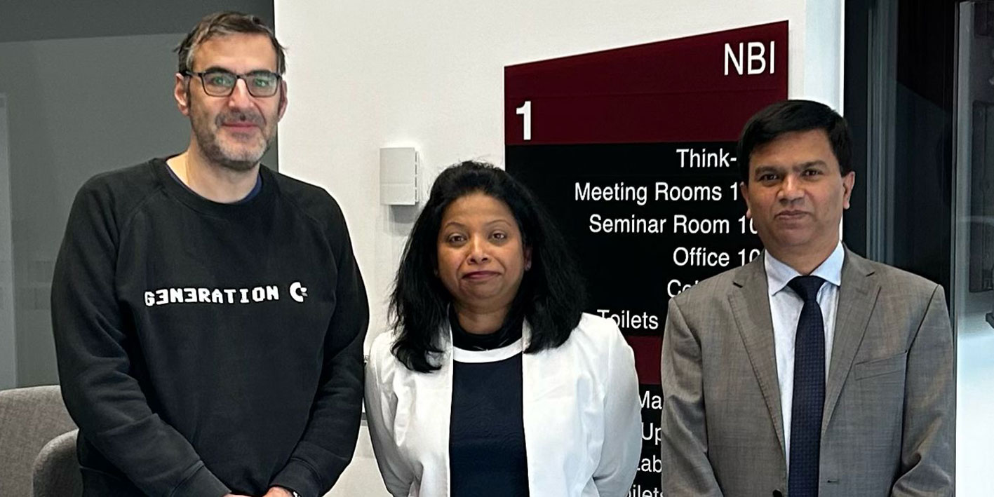 Research academics pose looking at the camera after winning research funding