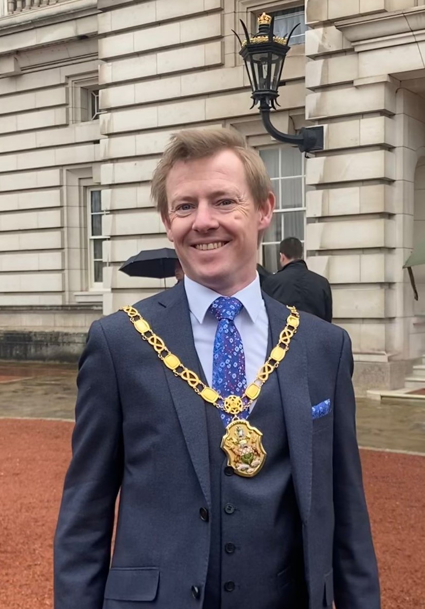 A portrait of teacher Daniel Kinsey with his official council chains on