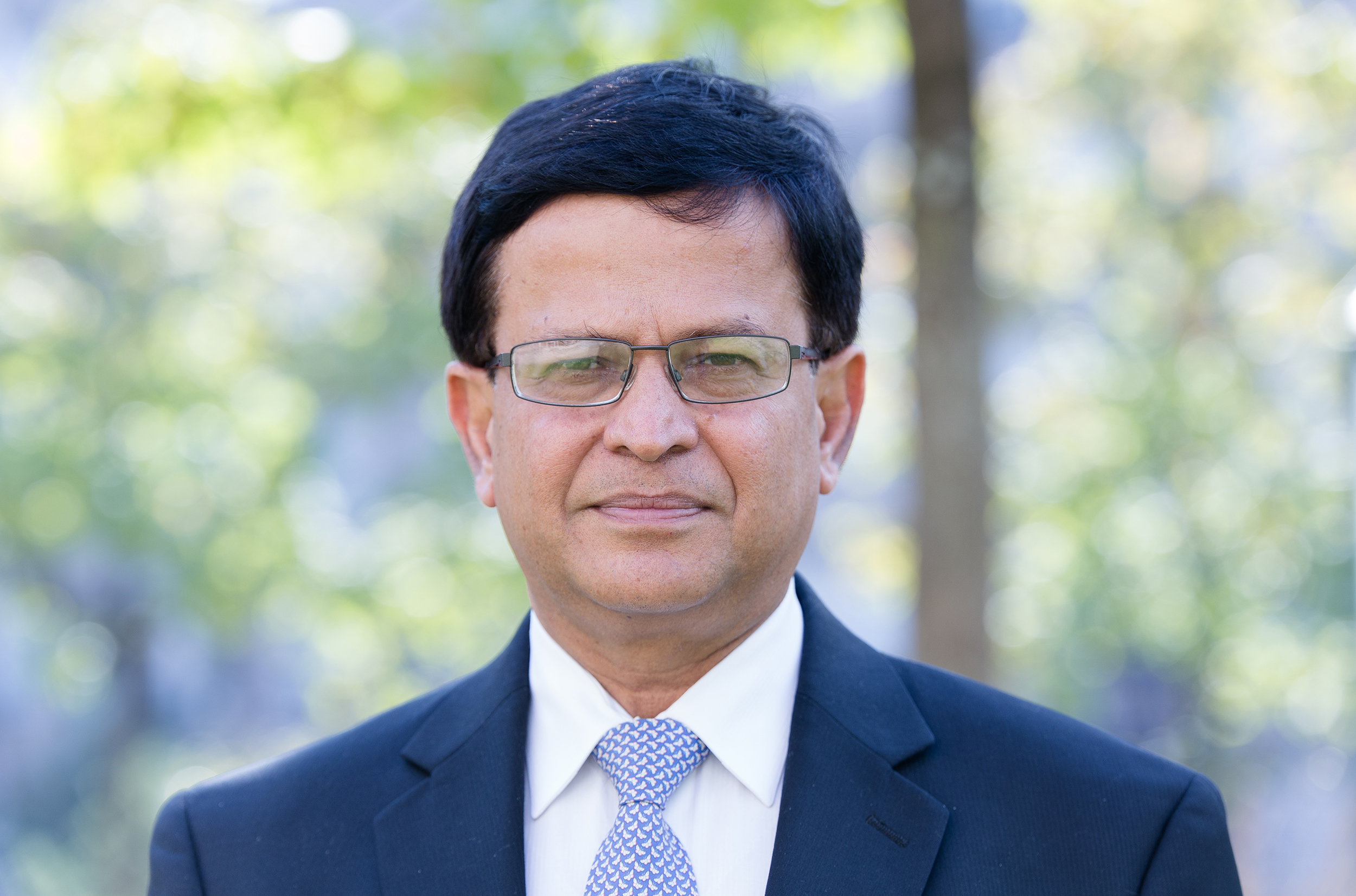 A portrait of a United Nations representative who is speaking at a conference run by FABSS