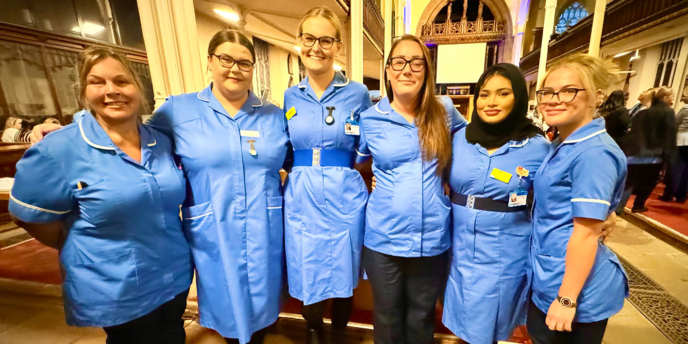 A group of nurses celebrating at their nurse badging ceremony
