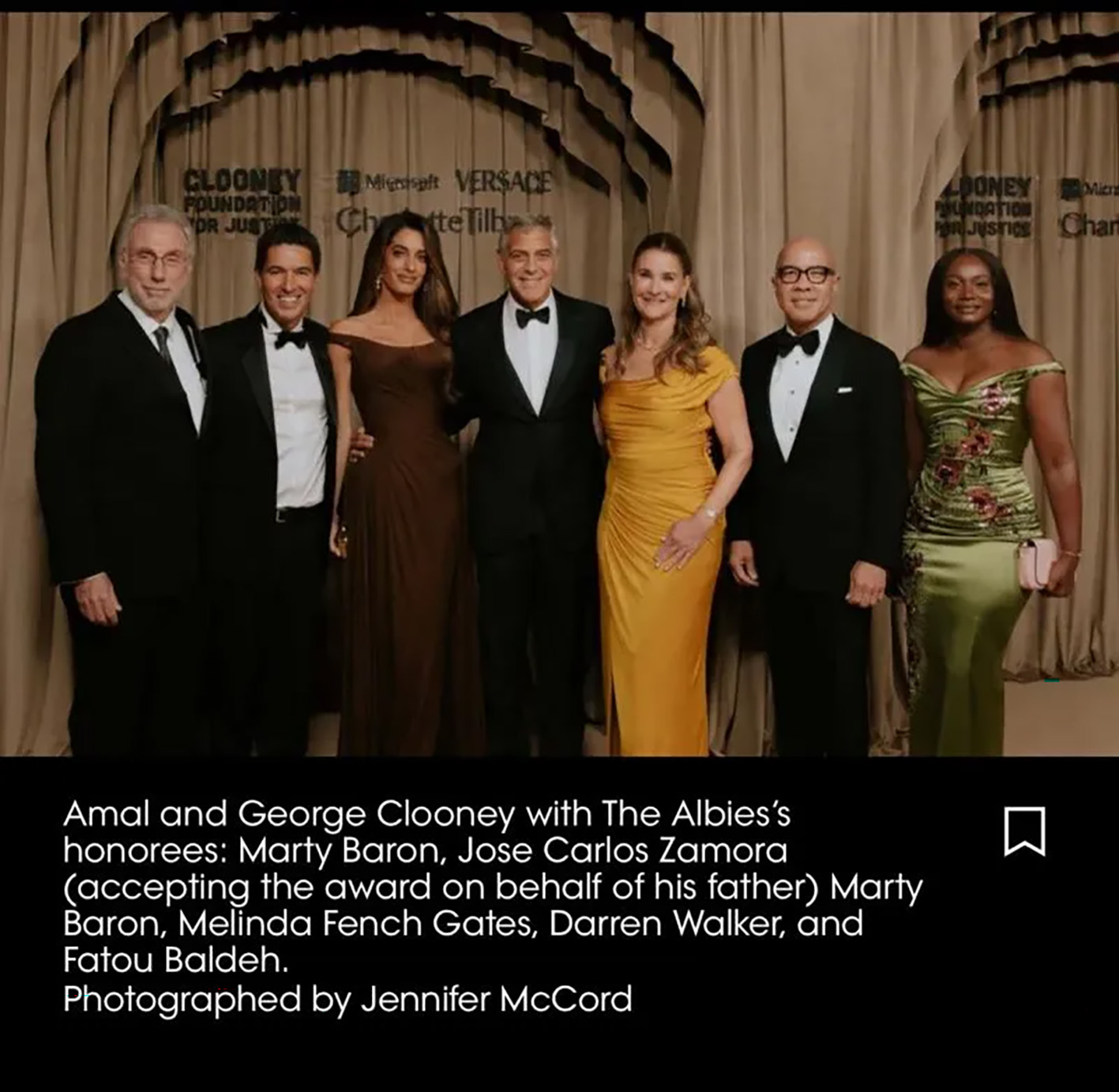 Fatou Baldeh posting with George Clooney and guests at the Clooney Foundation Awards