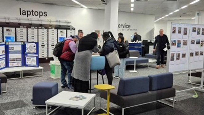 Group of students giving feedback on the Harrison Refurbishment