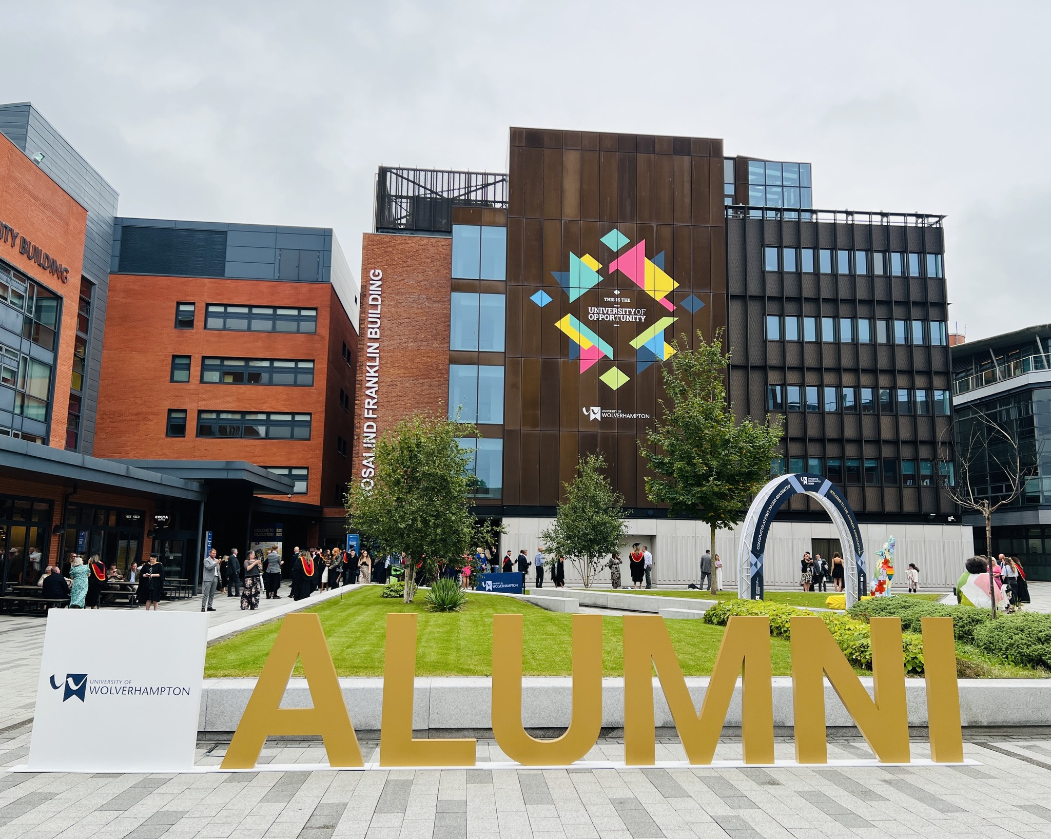 A picture taken in the City Campus courtyard with big WLV Alumni letters to celebrate graduation